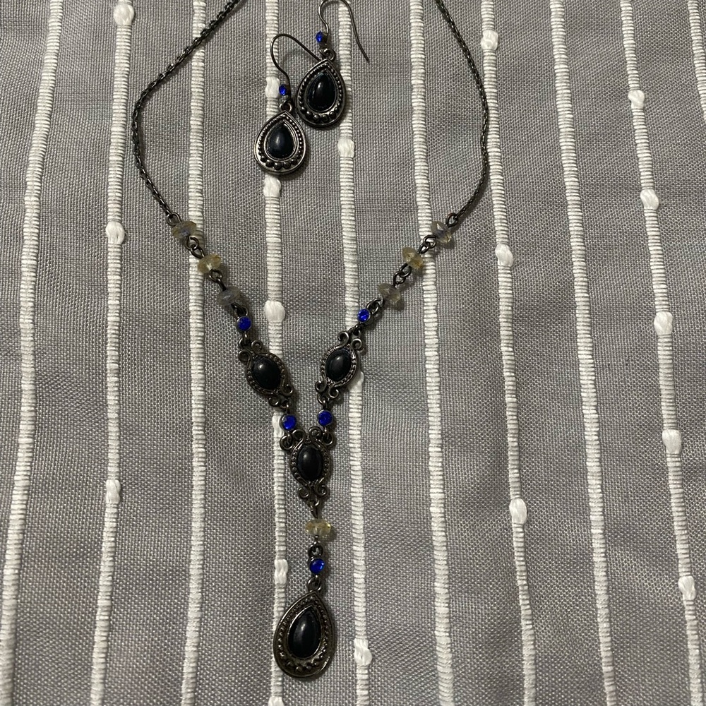 Several costume earring/necklace jewelry sets. Lots of wear left on them!